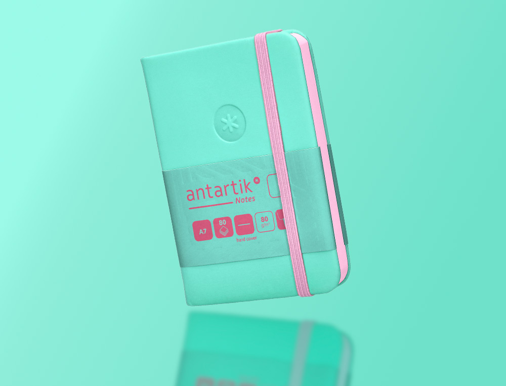 CADERNO COM ELASTICO ANTARTIK NOTES CAPA DURA A7 LISO ROSA E TURQUESA 80 FOLHAS 80 GR FSC