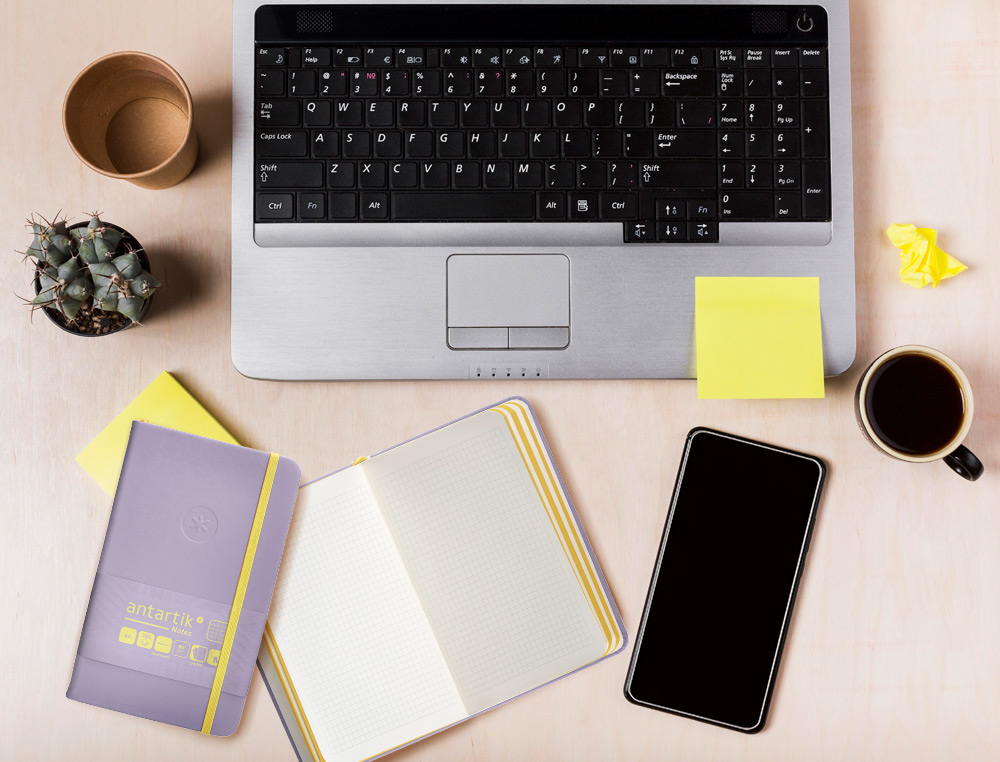 CADERNO COM ELASTICO ANTARTIK NOTES CAPA DURA A6 QUADRICULADO ROXO E AMARELO 100 FOLHAS 80 GR FSC